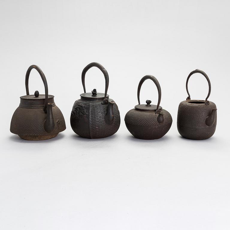 Four Japanese teapots.