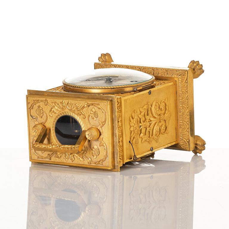 A late empire mantel clock, mid 19th century.