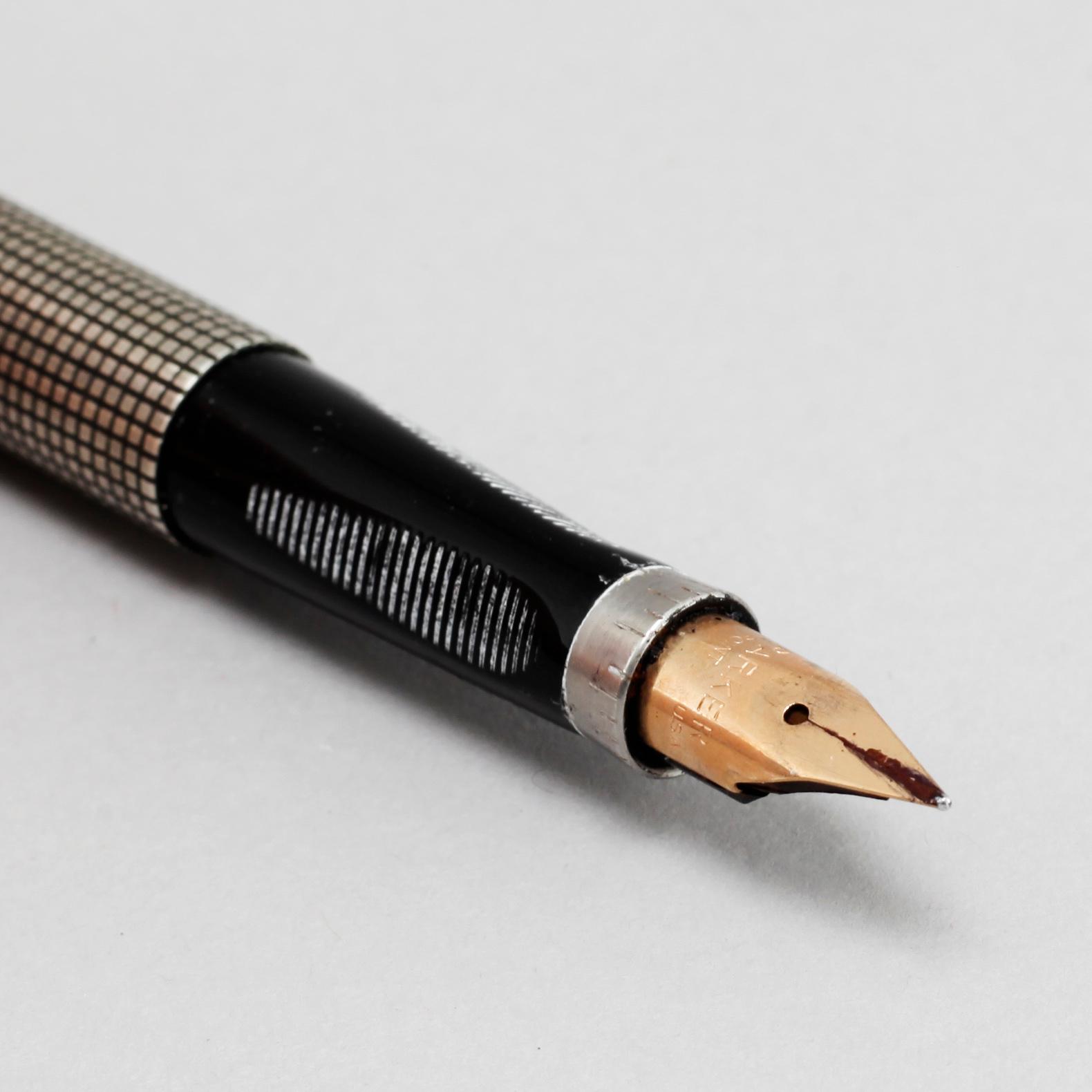 A sterling silver fountain pen and ball point pen by Parker, second half of the 20th century.