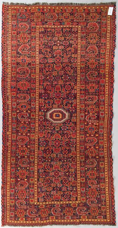An Antique Beshir carpet, ca 275x145 cm.