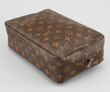 A Louis Vuitton "Trousse Toilette 28" beauty bag.