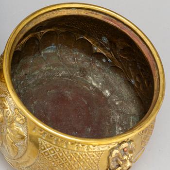 Two 19th century brass flower pots.