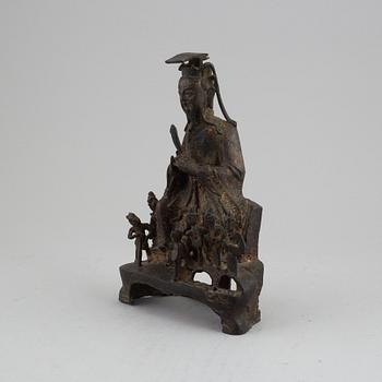 A bronze daoist dignitary with attendants, late Ming dynasty.