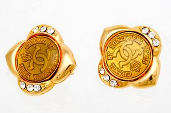 Chanel, earclips, metal, plastic and paste, approx 2,5 cm.