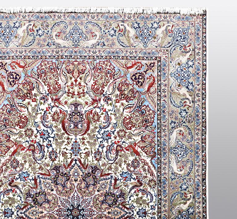 A carpet, Old Esfahan, part silk, ca 308 x 202 cm.