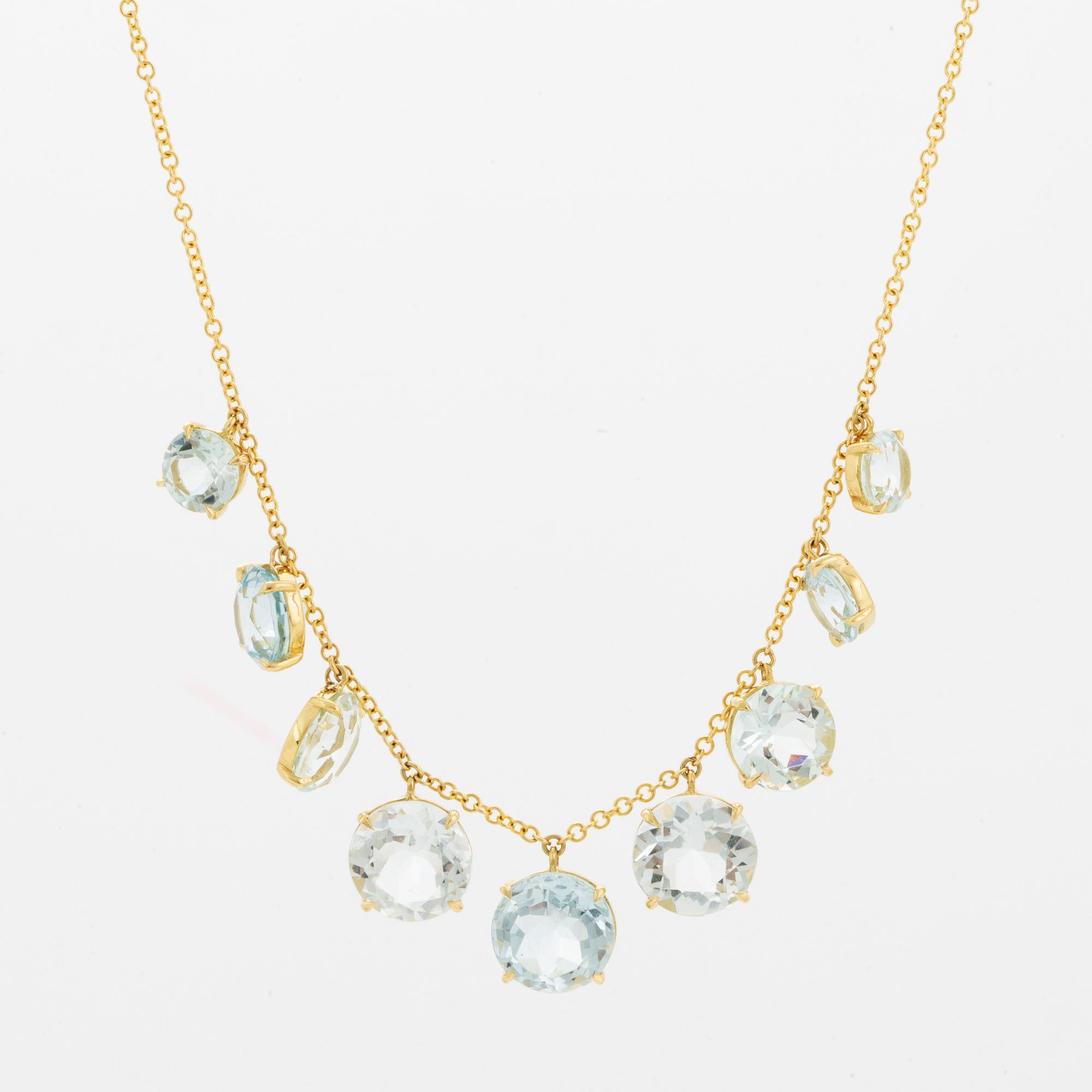Collier, med runda fasettslipade akvamariner.