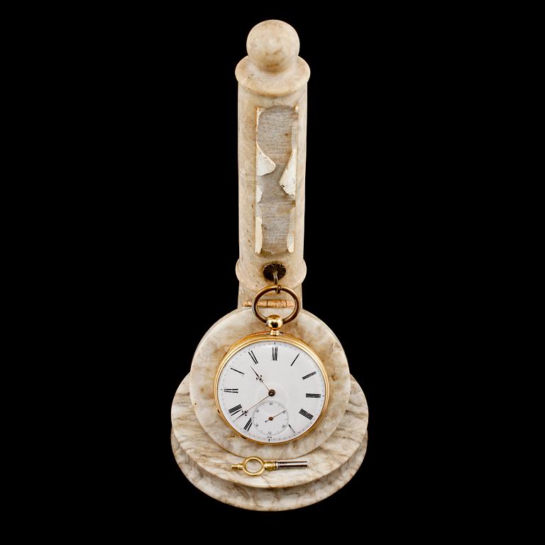 FICKUR, 18K guld samt klockställ, sekelskifte 1800/1900-tal.