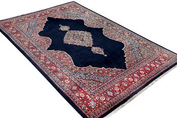 A Moud carpet, c. 310 x 206 cm.