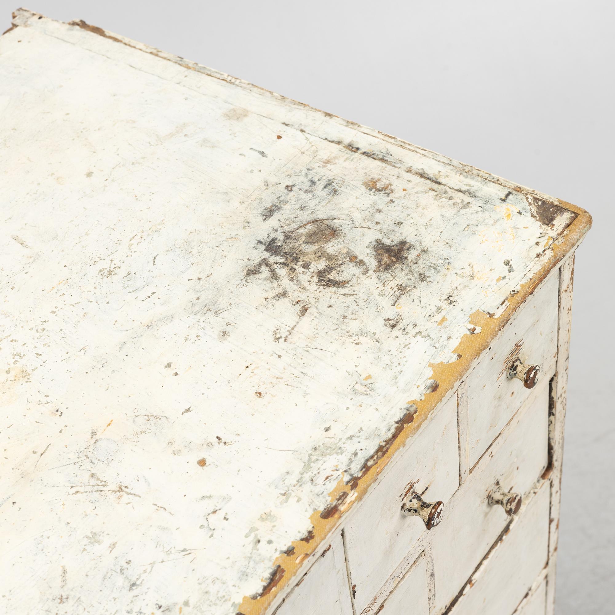 A painted chest of drawers, 20th Century.