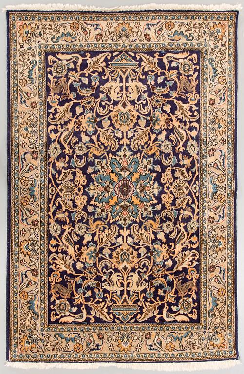 An old Ghom carpet ca 200x135 cm.