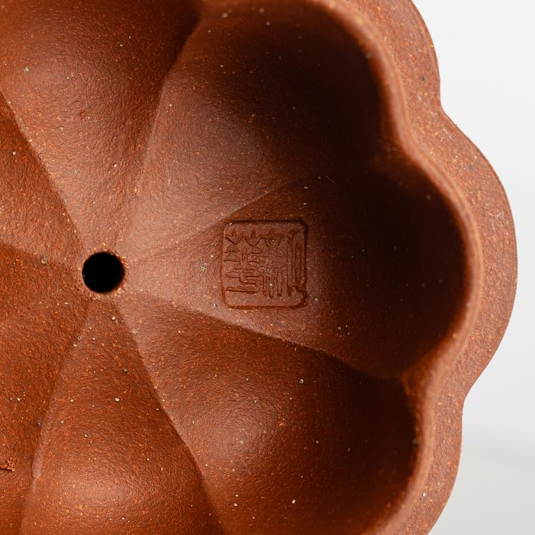 A Chinese yixing 'gourd' teapot, four cups and three saucers, 1980s.