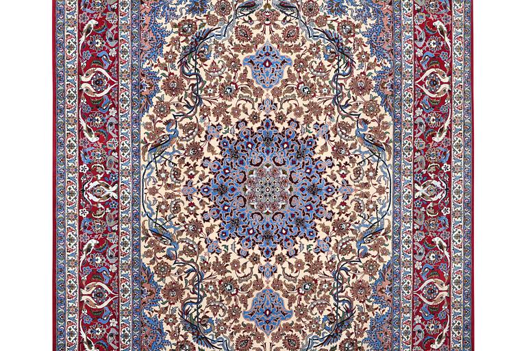 An Esfahan rug, part silk, c. 243 x 158 cm.