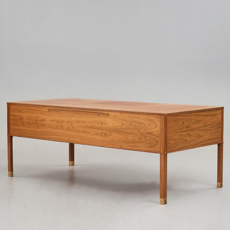 Ole Wanscher, a palisander desk by cabinetmaker A.J. Iversen, Denmark 1940's-50's.