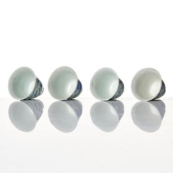 A set of four blue and white dragon wine cups, 'Hatcher Cargo', 17th century.