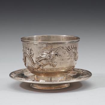 An export silver cup and saucer, probably Shanghai, early 20th century.