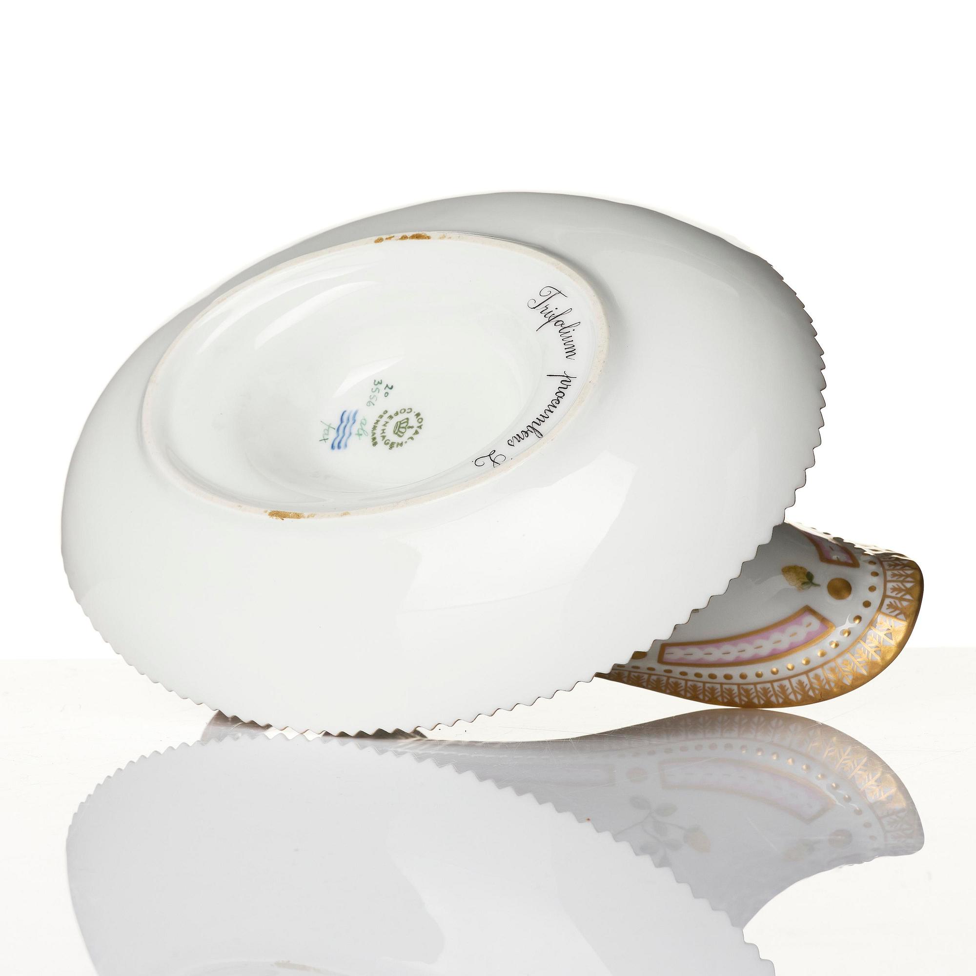 A Royal Copenhagen 'Flora Danica' sauce boat and a pillow shaped bowl, Denmark, 20th century.