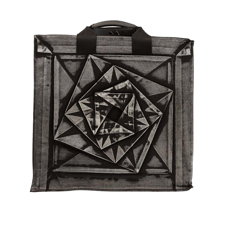 An Issey Miyake monograph published by Taschen, limited edition, in original box and wrapping.