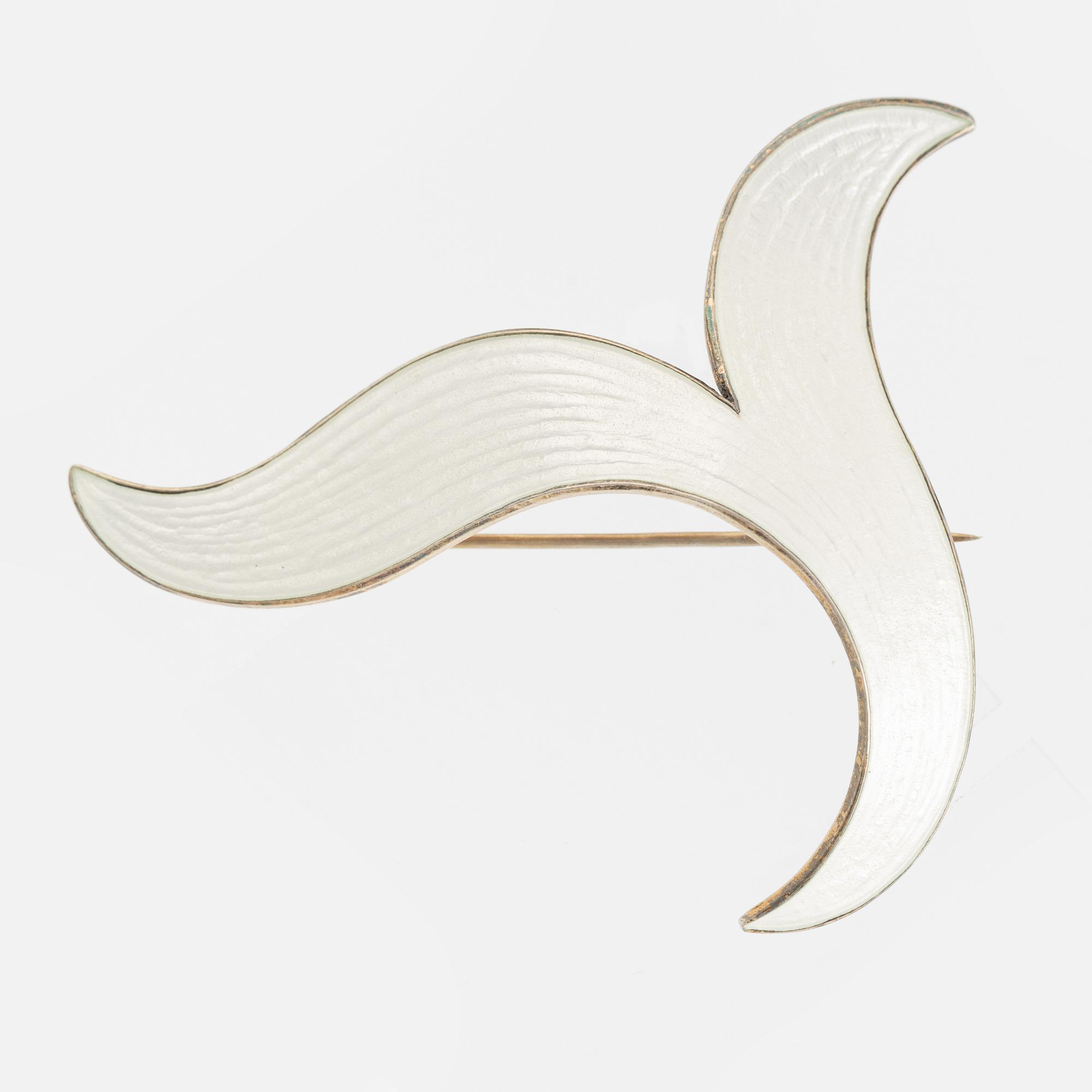 Brooch and a pair of earrings, sterling silver and white enamel. Norway.
