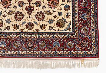 A semi-antique Isfahan rug, c. 225 x 143 cm.