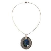 Saara Hopea, a silver necklace with a pendant set with an oval cabochon-cut spectrolite, Ossian Hopea, Porvoo 1974.