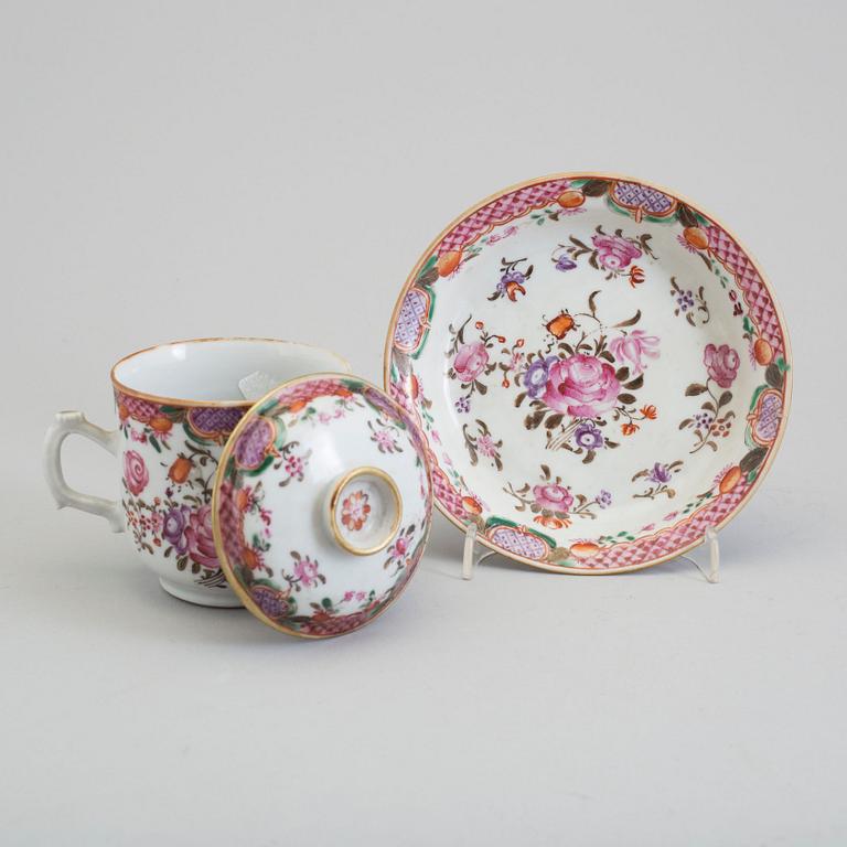 A pair of famille rose cups with covers and stands, Qing dynasty, Qianlong (1736-95).