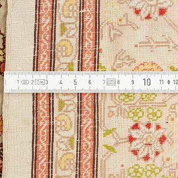 A Hereke silk rug, c. 130 x 87 cm.