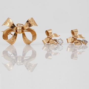 ÖRHÄNGEN & BROSCH, 3 delar, 18 k guld med bergskristall, bland annat Guld & Juveler Ab, Stockholm, 1949. Tot vikt ca6,2g