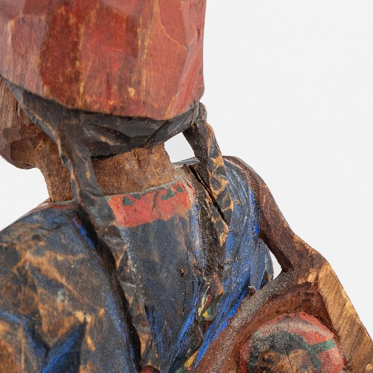 Torborg Lindberg-Karlsson, a pair of figurines, carved and painted wood, signed TL.