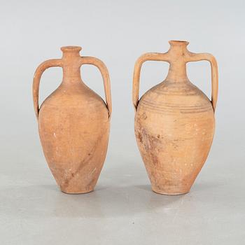 Two European earthenware jars from the first half of the 20th century.