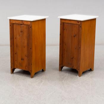 A pair of bedside tables, early 20th century.