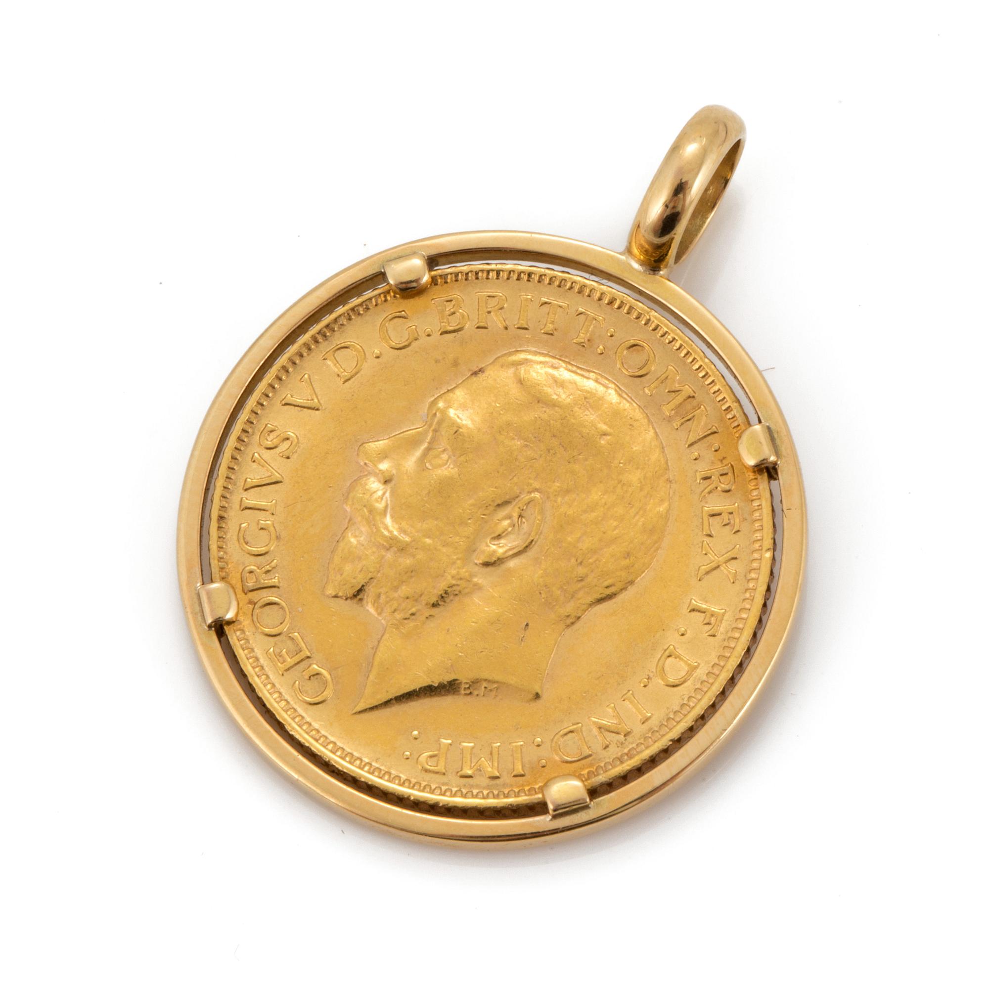 A 21,6K gold 1913 Sovereign coin pendant.