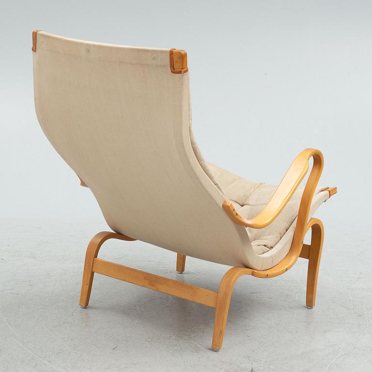 Bruno Mathsson armchair, "Pernilla" with footstool, Dux, late 20th century.