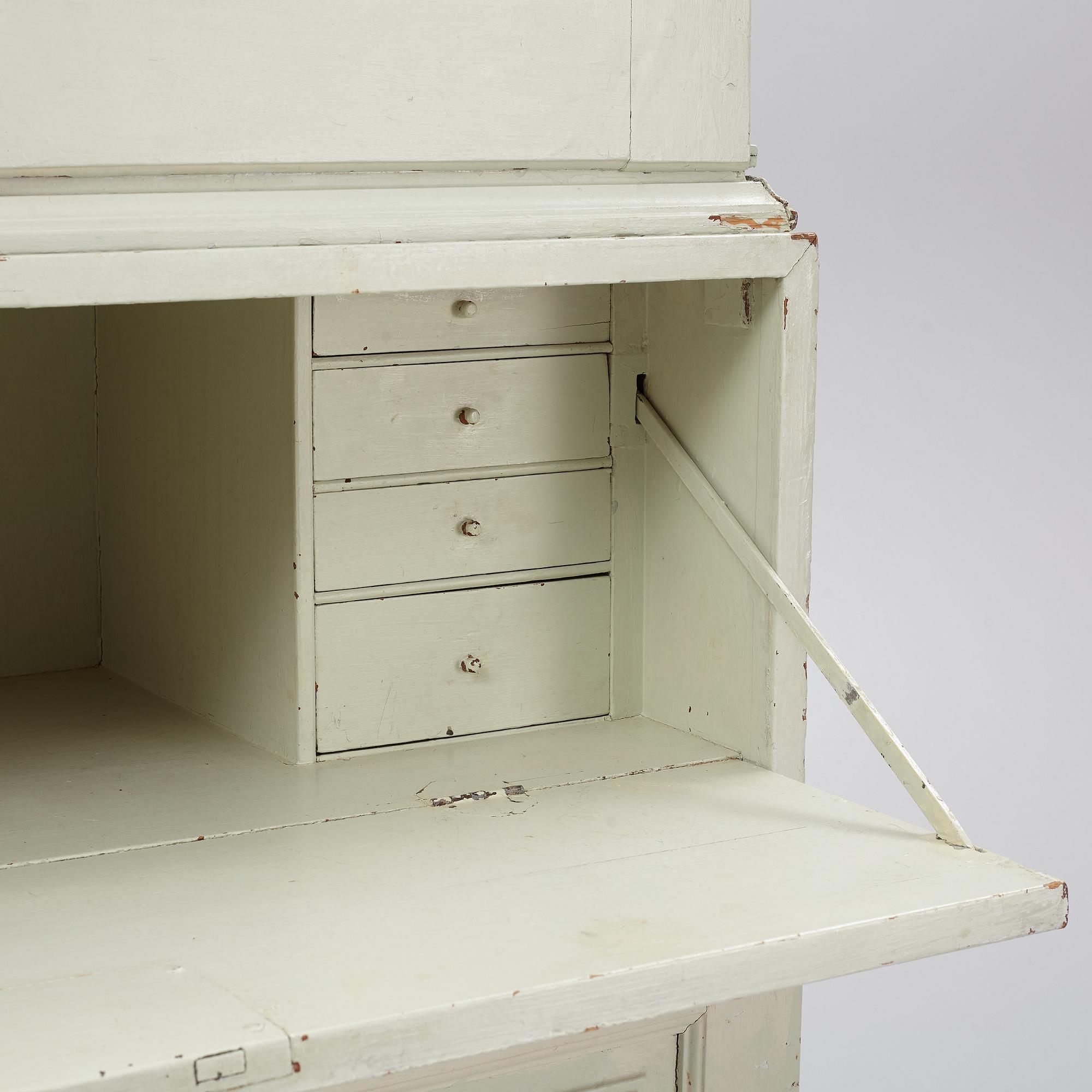 A 18th century panited cabinet.