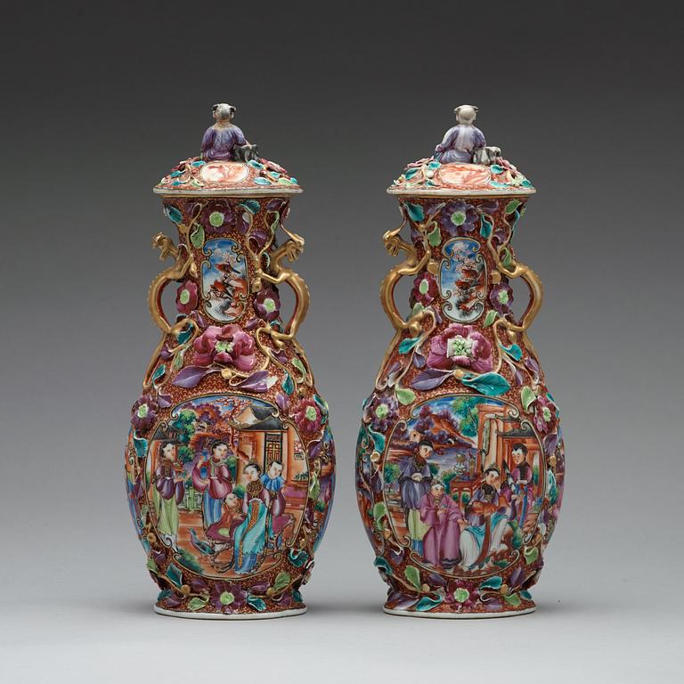 A pair of famille rose vases with covers, Qing dynasty, Qianlong (1736-95).