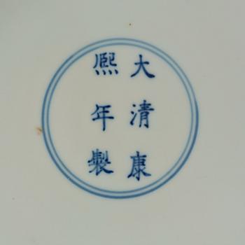 A large green enamelled blue and white dragon dish, probably late Qing dynasty with Kangxi's six character mark.