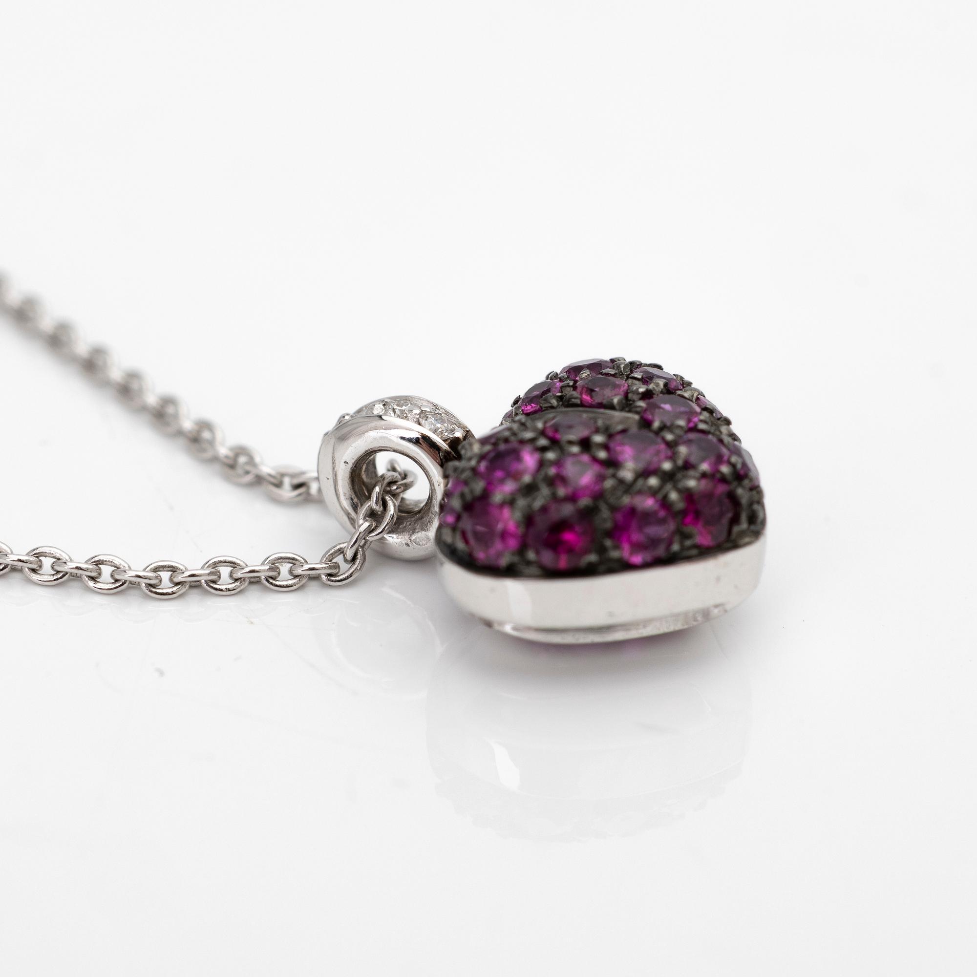 Necklace, 18K white gold, with a heart-shaped pendant in black rhodium-plated white gold set with rubies and brilliant-cut diamonds.