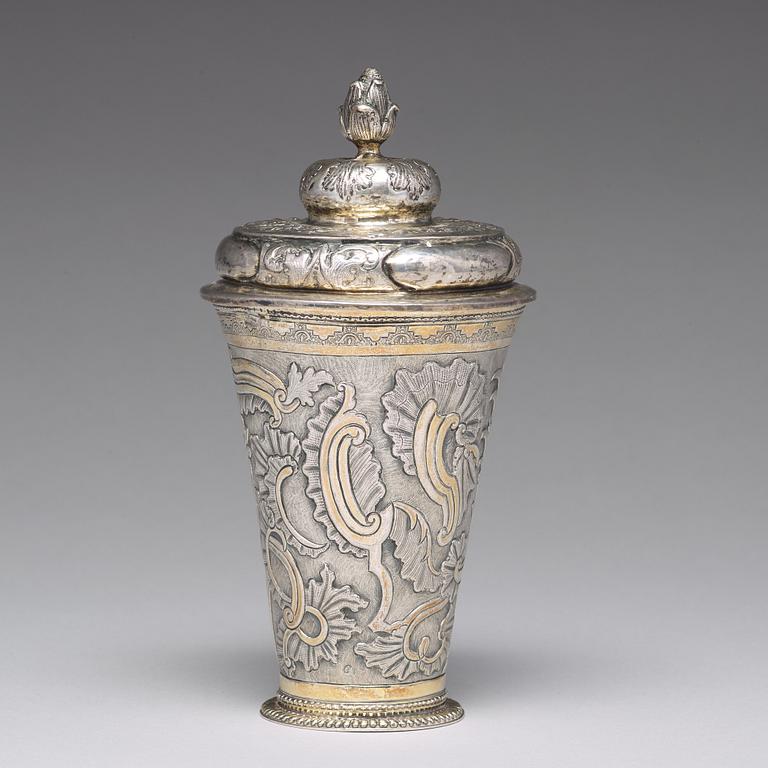 A Russian 18th century parcel-gilt silver beaker and cover, mark of Grigorij Poltow, Moscow (1755-1768).