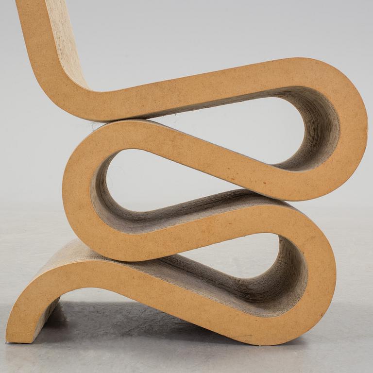 A 21 th century Frank O. Gehry "Wiggle Side Chair" for Vitra, Germany.