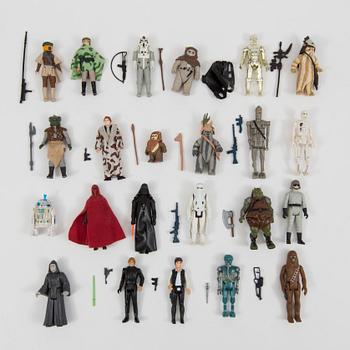 A lot of 27 Star Wars action figures and vehicles by Kenner 1970/80s.