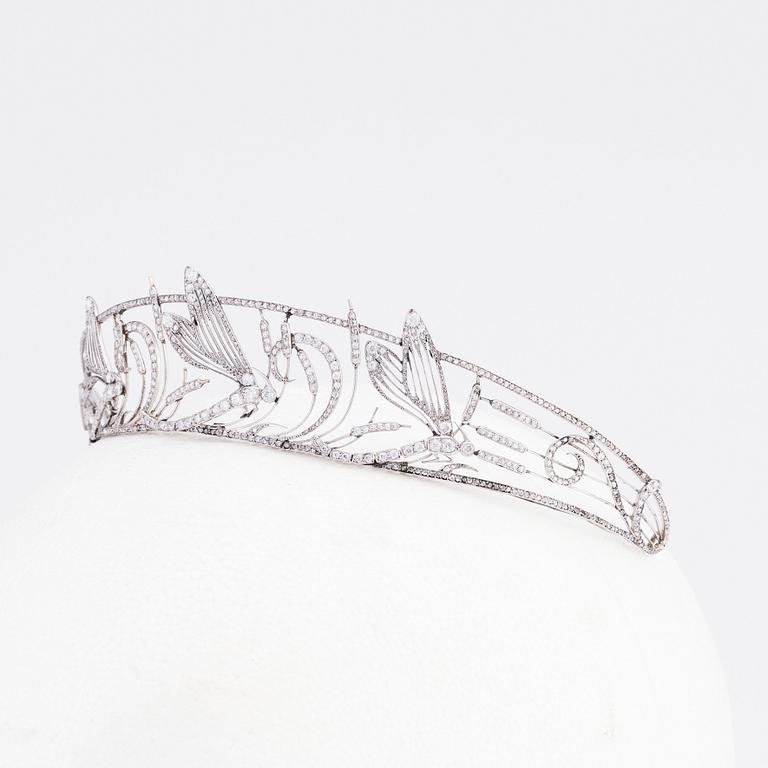 An important Boucheron dragonfly tiara, 1909, platinum set with diamonds.