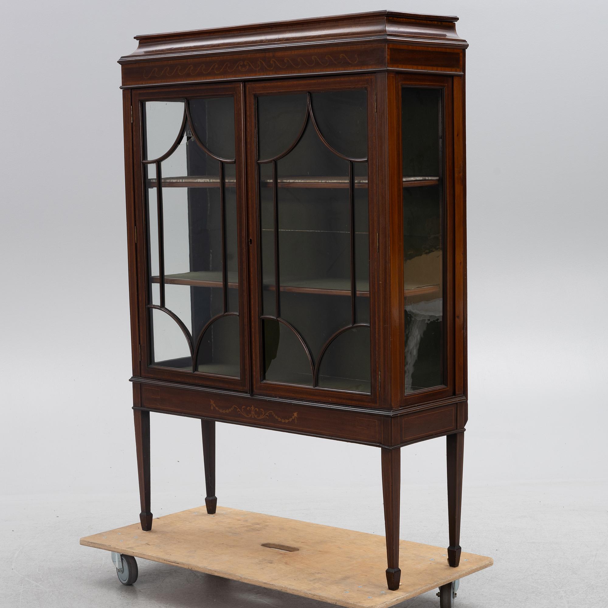 Display cabinet, England, early 20th century.