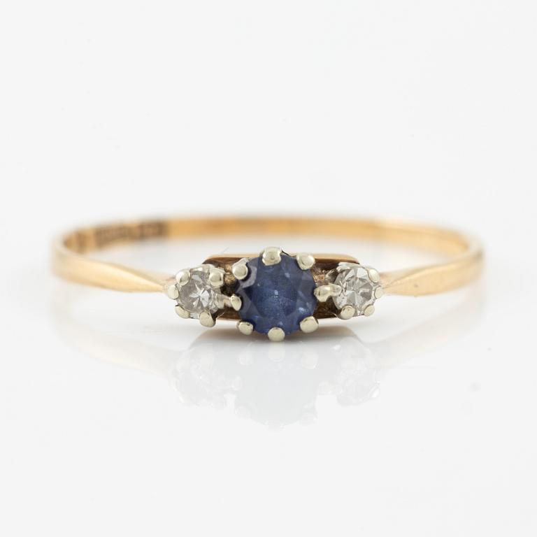 Ring, 18K gold with a small sapphire and octagon-cut diamonds.