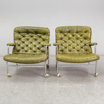 BRUNO MATHSSON, a pair of 'Karin' easy chairs, from DUX, second half of the 20th century.