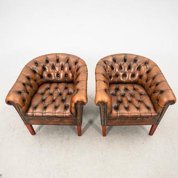 A pair of leather armchairs. second half of the 20th century.