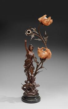 An Art Noveau zink table lamp, ca 1900.