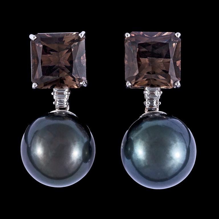A pair of cultured Tahiti pearl,14,8 mm, smoky quartz and diamond earrings, tot. app. 0.25 cts.