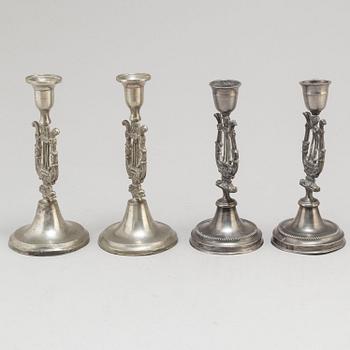 Two pair of Swedish pewter candlesticks, early 19th century and ca 1900.