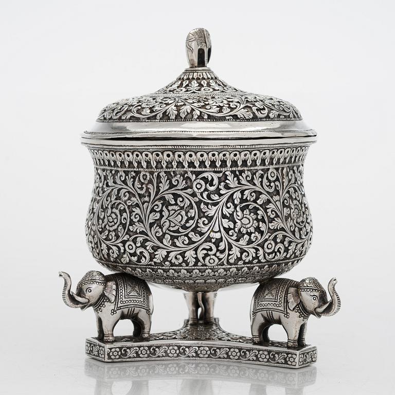 A 19th-century lidded tripod silver bowl, India.