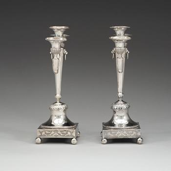 A pair of Swedish late 18th century silver candelabra, marks of Olof Hellberg, Stockholm 1799.