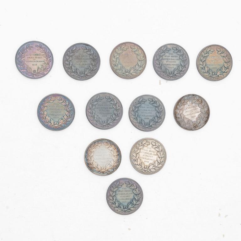 Medals, 12 pcs, silver, Kungl Myntverkt, Sweden, circa 1900.